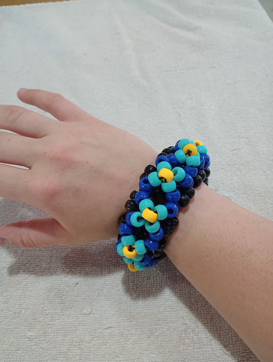 Blue and yellow UFO cuff