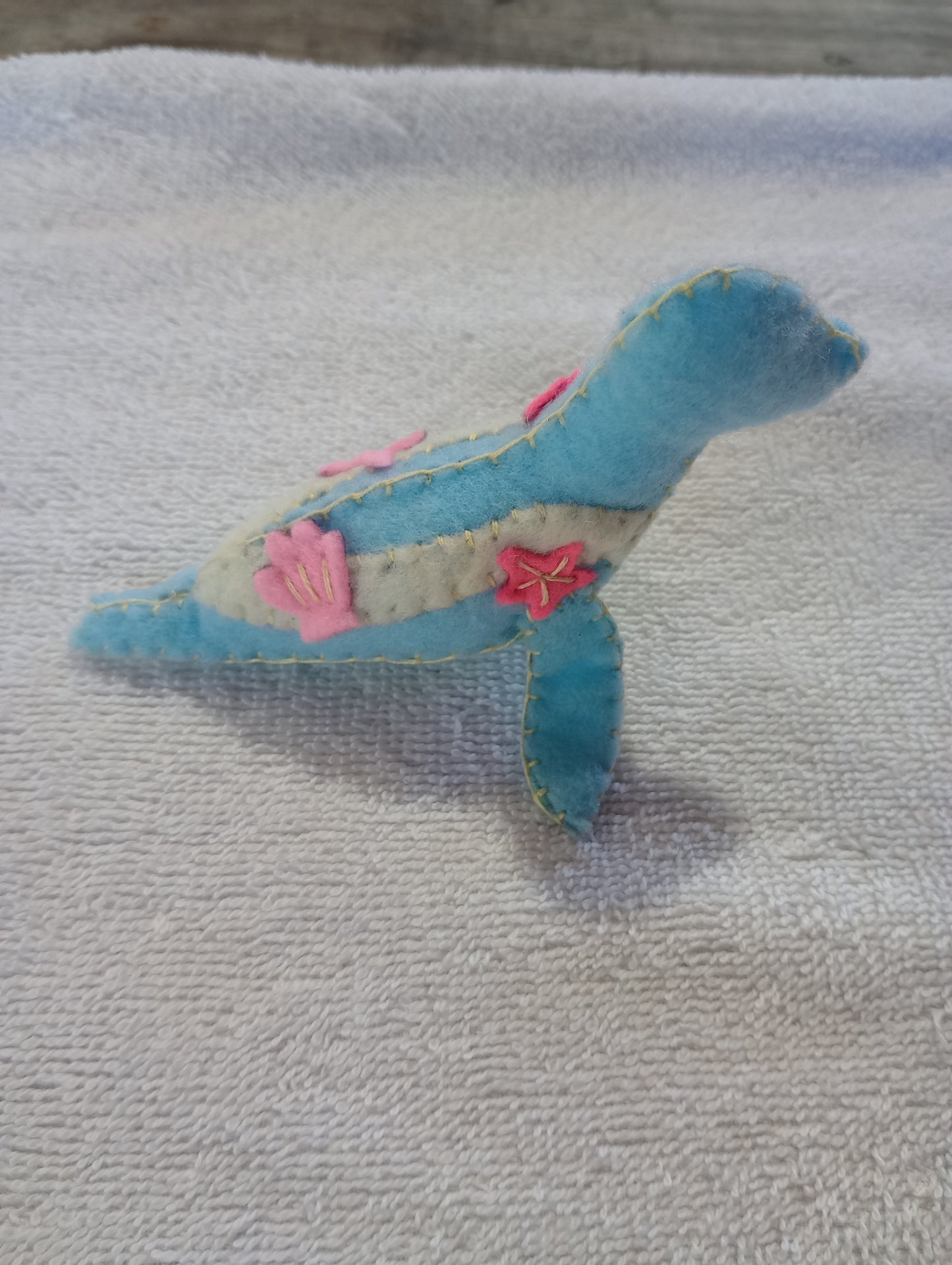 Seashell seal guy crystal: pink coral
