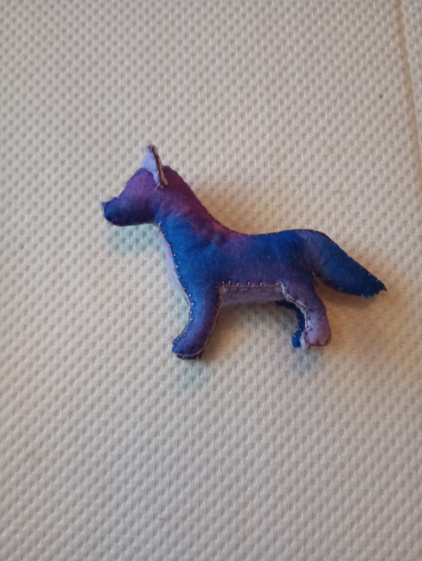 Cosmic wolf guy, crystal: pink coral