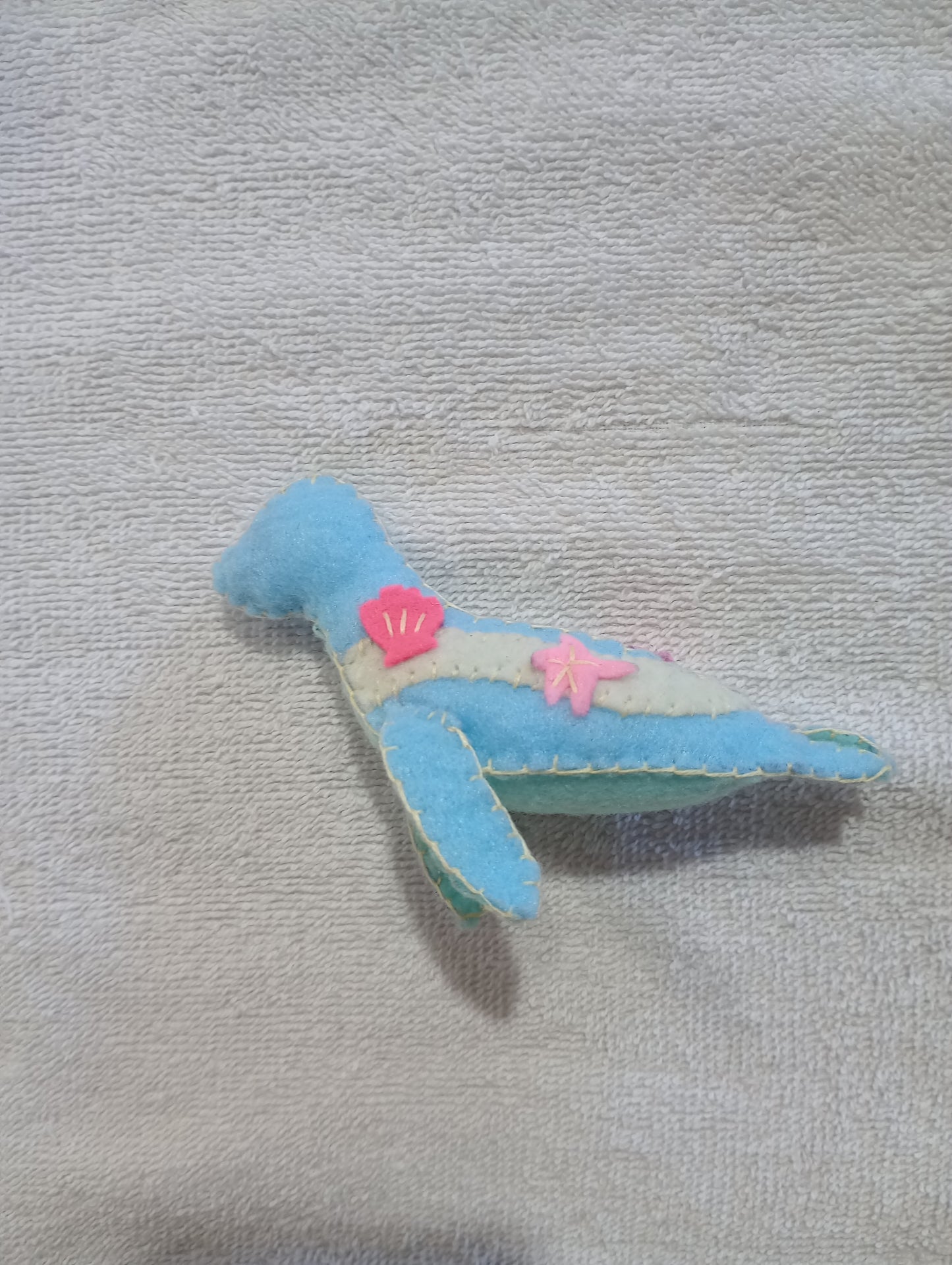 Seashell seal guy crystal: pink coral