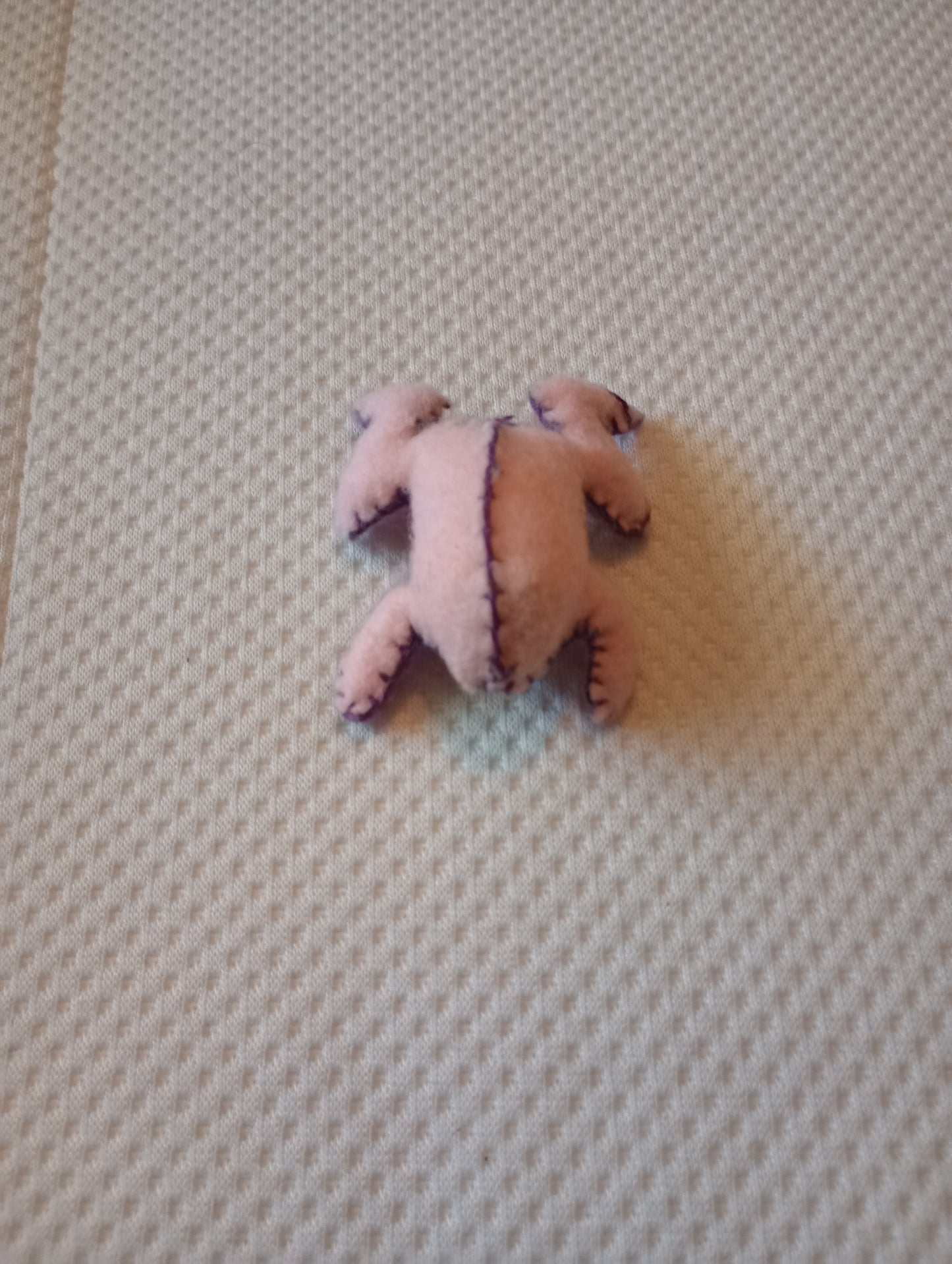 Pink and purple frog guy, crystal: random