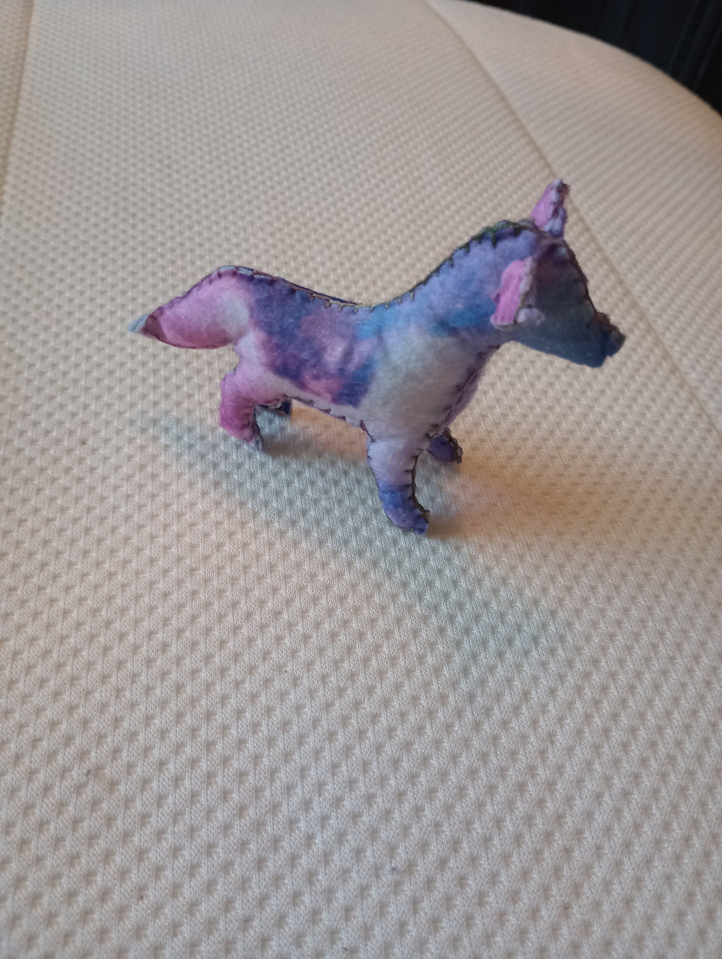 Cosmic wolf guy, crystal: pink coral