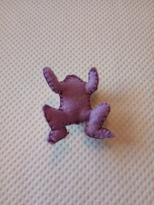 Pink and purple frog guy, crystal: random