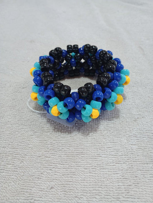 Blue and yellow UFO cuff